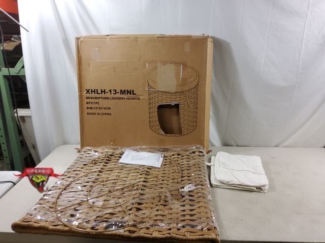 Lot 7-134015 - Woven laundry hamper with liner. 24-1/2"H.