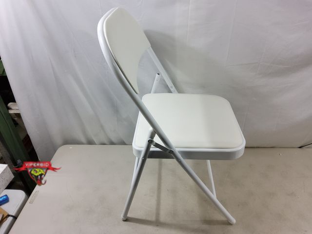 Lot 7-130734 - White folding chair with padded seat.