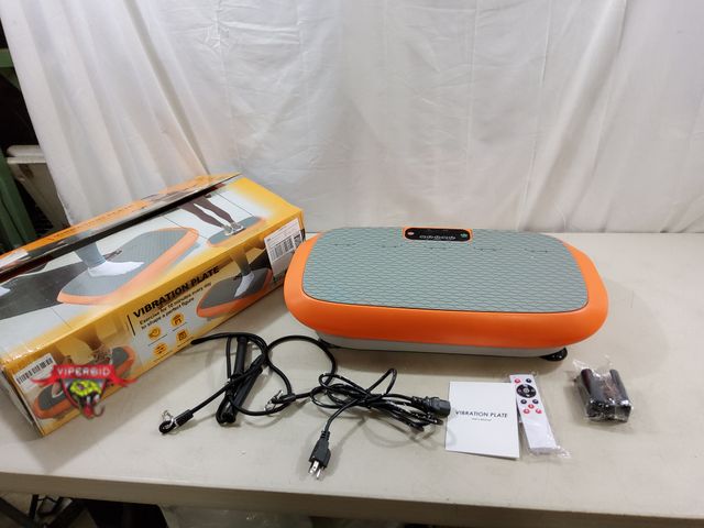 Lot 7-123568 - Vibration plate with remote and resistance band.