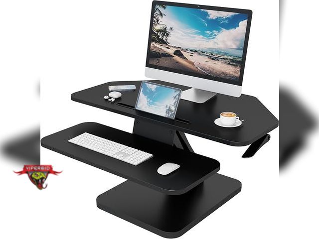 Lot 7-134975 - Damage to back corner - LH Side. Sit and Stand Desktop. 32". Model A002-GSD76.