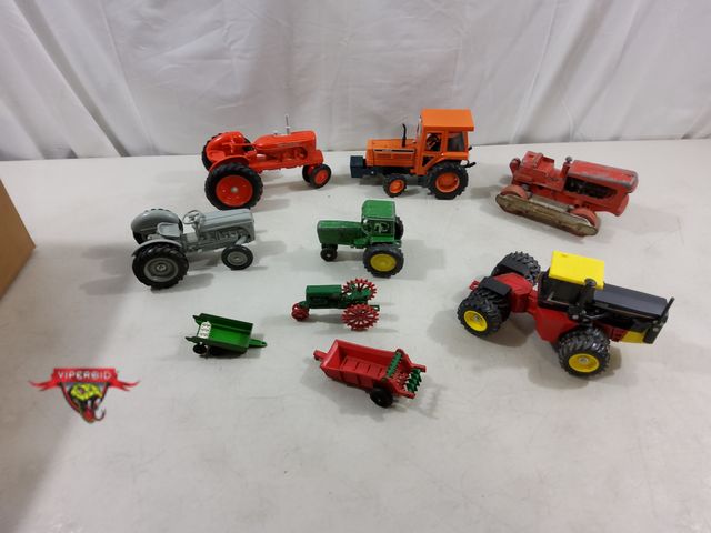 Lot 7-123811 - Mostly Vintage! Lot of assorted die-cast metal tractors.