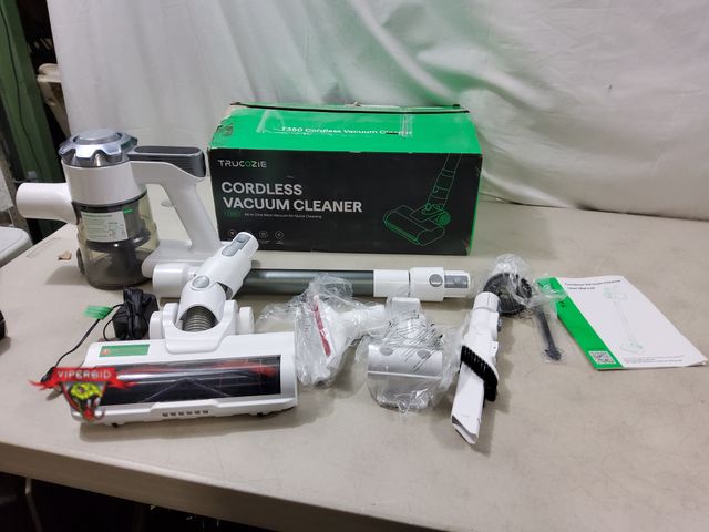 Lot 7-130147 - TruCozie Cordless vacuum cleaner. Model A27-ICR18650. Tested to power on - suctions. Gently used.