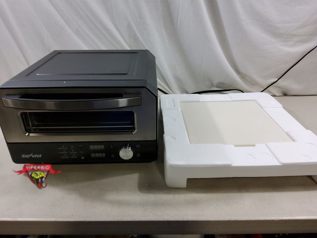 Lot 7-132854 - Sunvivi electric pizza oven. Tested to power on - heats up. Appears lightly used.