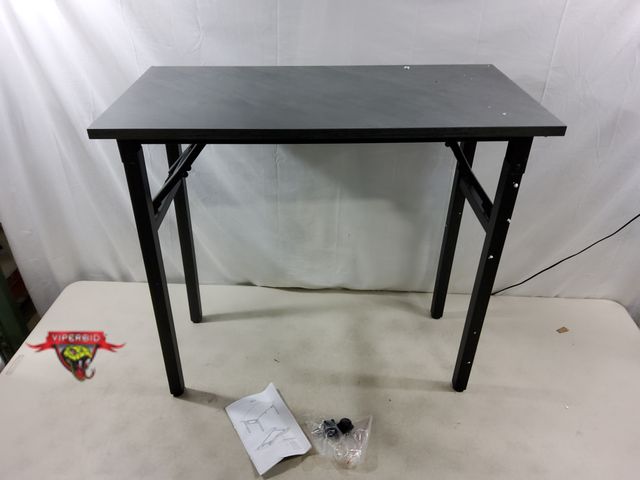Lot 7-131229 - Folding table with metal legs. 31-1/2" X 15-3/4" X 29-1/4"H.