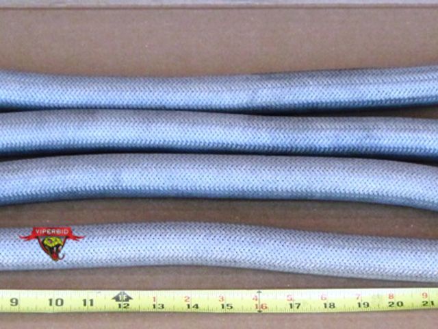 Lot 7-132523 - Four stainless steel flex hoses with woven stainless steel cover.  End tubing is 3/4" OD.