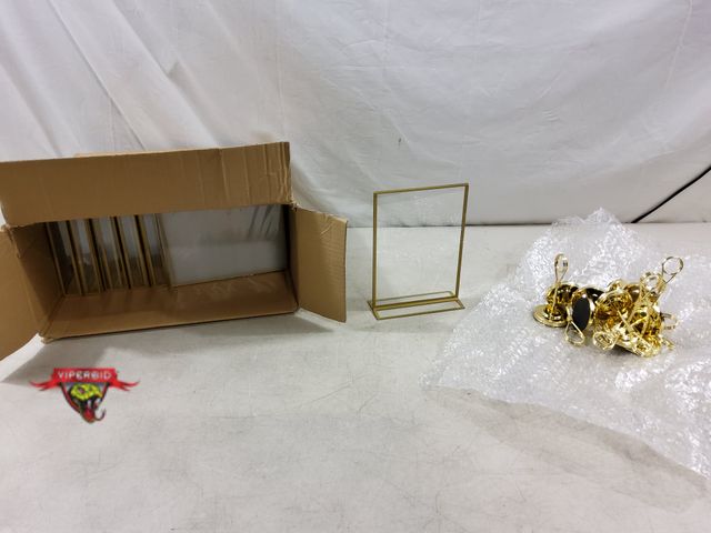 Lot 7-132690 - (20) Plastic frames (5-1/4"W X 7"H) and (12) Gold metal sign holders.