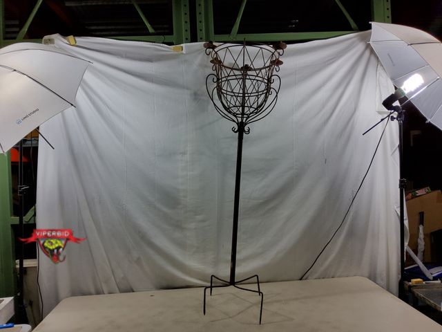 Lot 7-130819 - Wrought iron outdoor plant stand. 54"H.