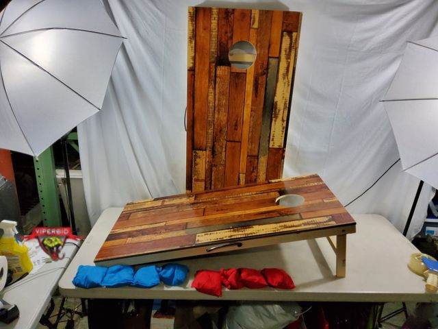 Lot 7-133995 - Set of Cornhole boards with red &amp; blue beanbags. Slight damage to corners / sides.  see pics