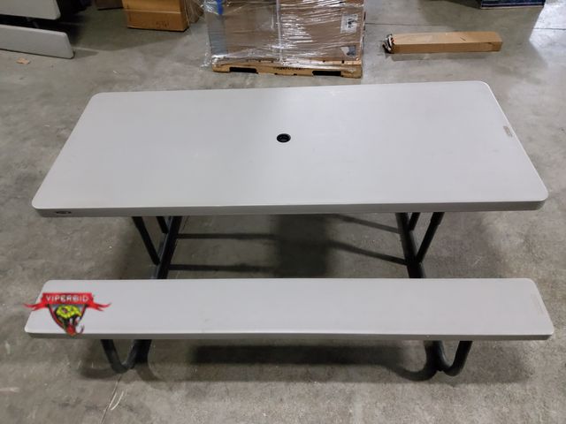 Lot 7-131408 - Lifetime 30" X 6 ft. Folding Plastic Picnic table. Benches are 6 ft. X 9". Great condition.
