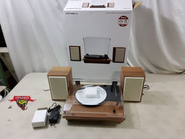 Lot 7-132650 - Victrola stereo turntable system with bluetooth. Tested to power on.