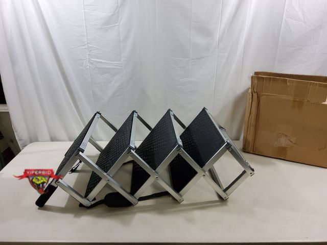 Lot 7-123555 - Folding 4-Step pet stair for vehicles.