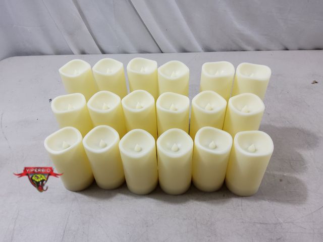 Lot 7-133097 - (18) Battery operated faux candles with remote.  Each one takes (2) AA Batteries (not included). Inc...