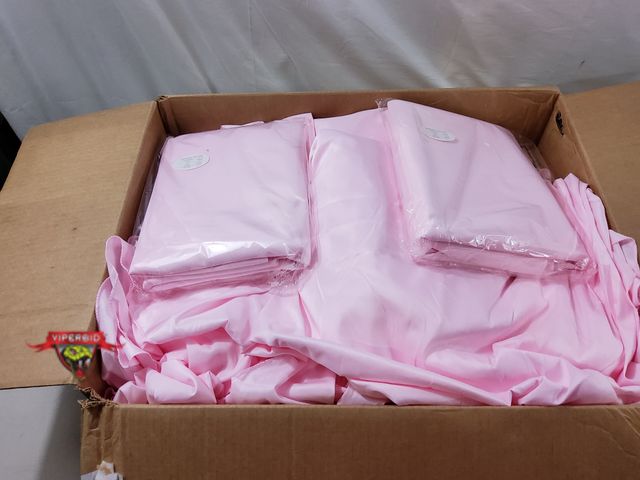 Lot 7-130338 - (12) Pink polyester round table cloths. 120" Dia. (2) Are new. (10) gently used - will need a quick ...