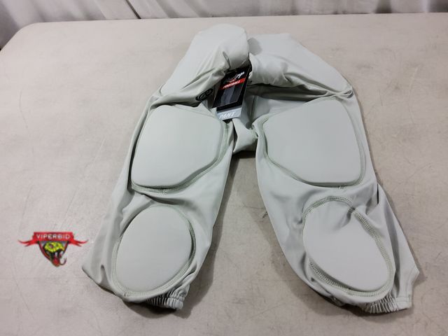 Lot 7-135655 - Look new! Rawlings youth football pants with pads. Size: 2XL.