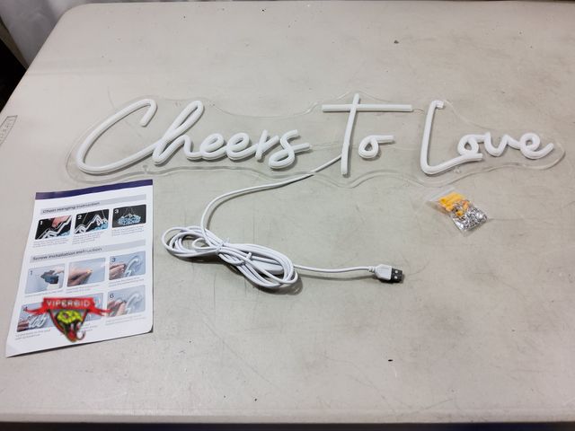 Lot 7-130671 - Cheers to Love led light sign with hanging chain. 25-3/4" X 7-3/4".