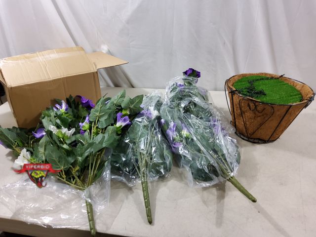 Lot 7-134775 - Hanging wire basket with coir and artificial flowers. Basket is 9-5/8" Dia. X 6-3/4"H.