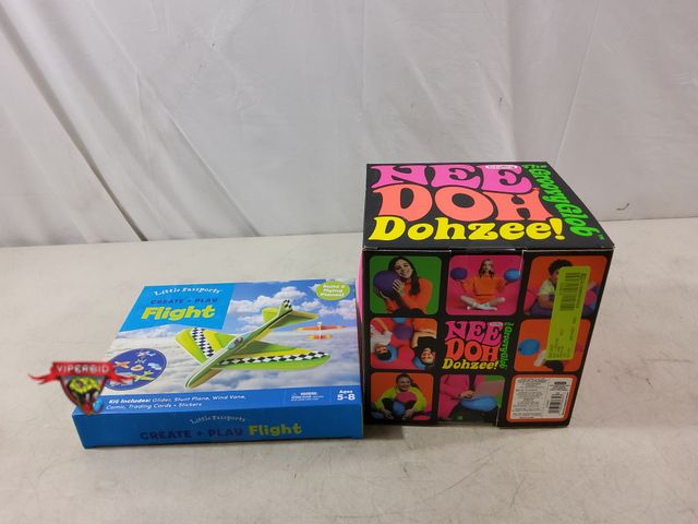 Lot 7-133795 - New! Schylling 8" Nee Doh Dohzee The Groovy Glob Soft Ball and a Little Passports Create + Play Flig...