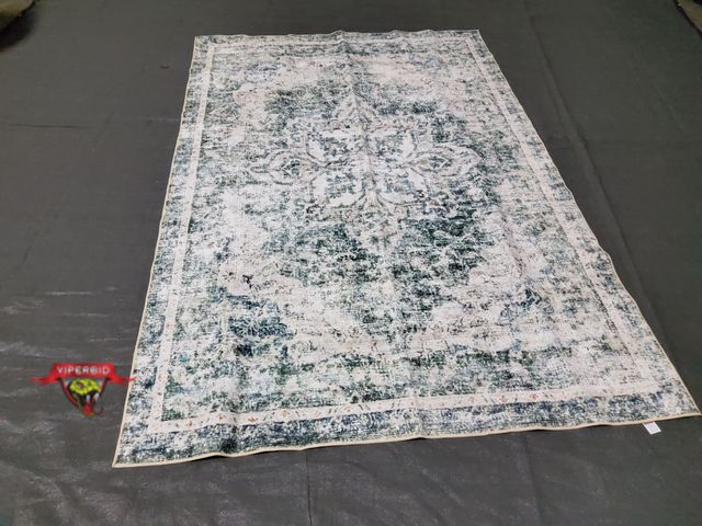 Lot 7-131567 - 6 ft. X 9 ft. Area rug.