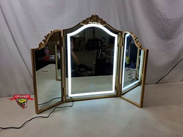 Lot 7-134914 - HSDDHOME Antique Gold Triple Fold Makeup Mirror with Tri-Color LED Lighting &amp; Dimming. 31" X 23"...