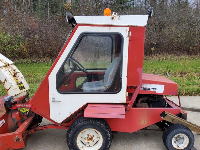 Lot 7-113672 - Toro Groundsmaster 72 With McKee snow thrower model 220. Note: Cracked windshield. Has fluid le...