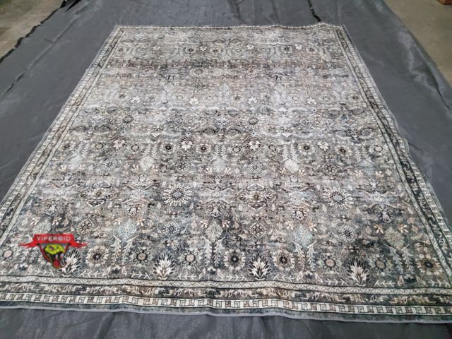 Lot 7-123764 - 8 ft. X 10 ft. Area rug.