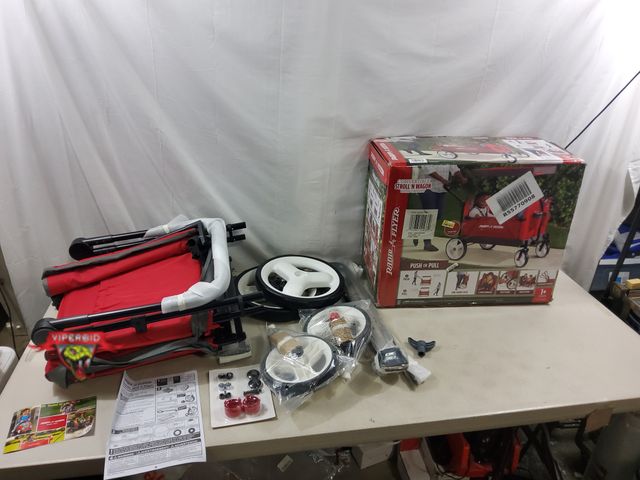 Lot 7-131892 - Radio Flyer convertible stroll 'n wagon with canopy.