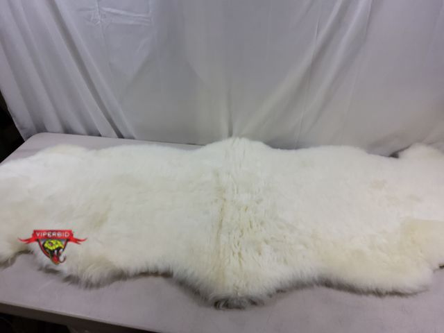 Lot 7-123730 - LLB genuine sheepskin 2 ft. X 6 ft. Rug.
