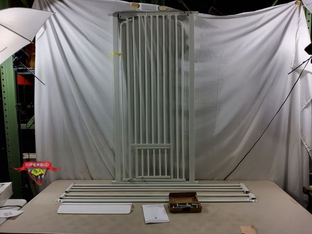 Lot 7-133397 - 53"H Metal Pet gate with bottom door.