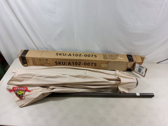 Lot 7-133991 - 7.5 Ft Patio umbrella. Tilts. Lightly used.