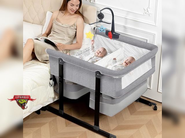 Lot 7-135032 - Retail value $170! Jestonen Twin bassinet. 36.61"L x 31.5"W x 31.69"H