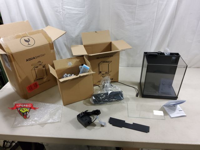 Lot 7-123549 - Aquasmith mini eco 2G Aquarium. Includes pump and filters.