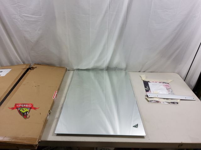 Lot 7-123721 - Frameless mirror. 28" X 20". Can be hung horizontally or vertically.
