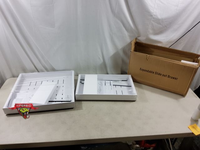 Lot 7-134548 - (2) Expandable metal slide out drawers. 12" to 20".