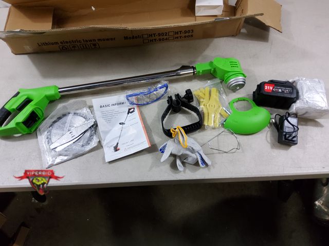 Lot 7-133006 - 21V Lithium Ion cordless weed wacker with 2 batteries and charger. Tested to power on.