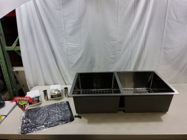 Lot 7-123664 - 33" X 18-7/8" Kitchen sink with accessories.