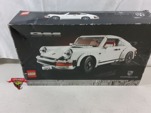 Lot 7-111960 - Lego Porsche 911 building set. #10295 1458-Pcs. Damaged box.