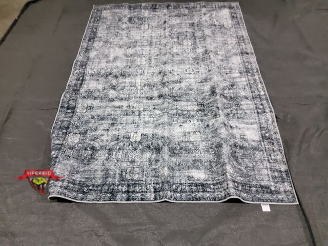 Lot 7-134305 - 5 ft. X 7 ft. Area rug.