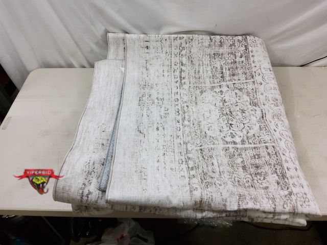 Lot 7-130885 - Lbris machine washable 8 ft. X 10 ft. low pile area rug.