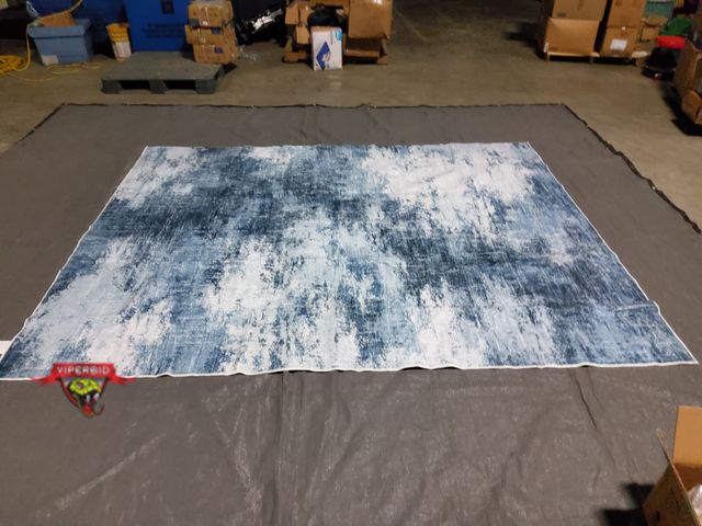 Lot 7-133736 - 8 ft. X 10 ft. Area rug.