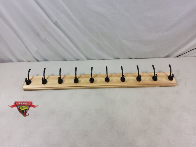 Lot 7-132728 - 38-1/8"L Wall mounted coat rack with metal hooks.