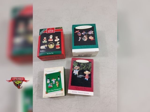 Lot 7-123448 - (4) Boxes of Hallamark miniature keepsake ornaments. Includes set of 6 Sew, sew tiny, set of 6 Tiny ...