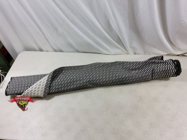 Lot 7-132785 - 4 ft. X 6 ft. patio rug.