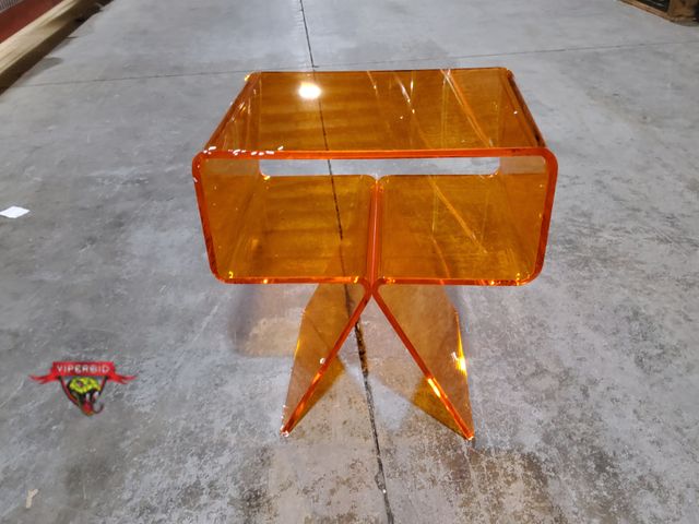 Lot 7-133265 - Retail $109! Orange acrylic side table - Modern design. 15-3/4" X 11-3/4" X 17-3/4"H.