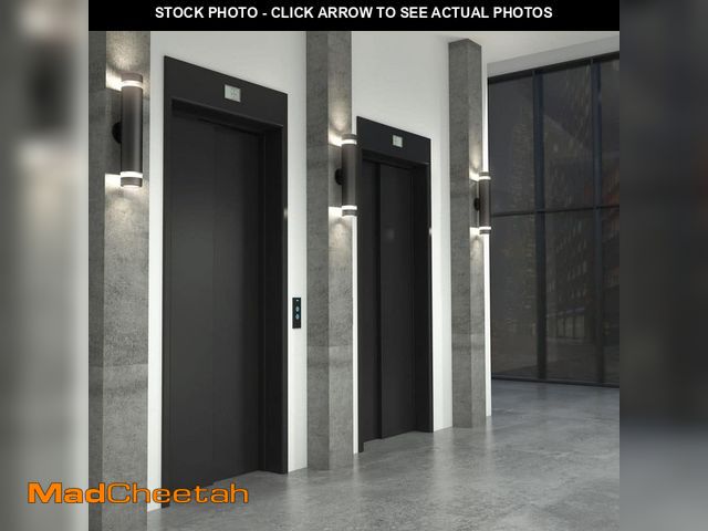 Lot 74-12916049 - Artika C7 Black Modern Large Integrated LED Exterior Hardwired Garage and Porch-Light Cylinder Sconc...