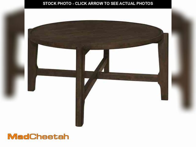 Lot 74-12464863 - *SEE DETAILS* Coaster Cota 38.25 in. Dark Brown Round Solid Wood Coffee Table *SEE DETAILS*  - USED