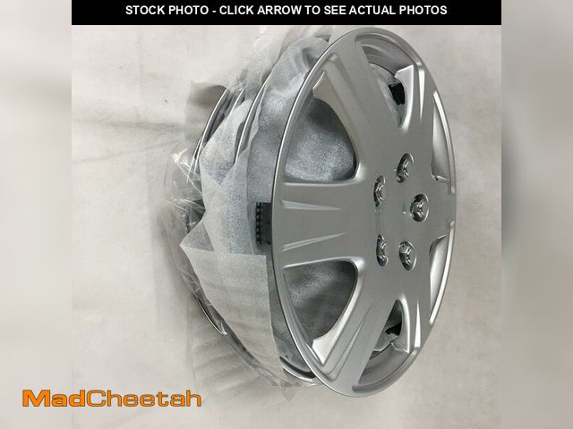 Lot 74-12665056 - Four ABS Plastic Silver Colored Hubcaps - 15 Inch Diameter - UNUSED