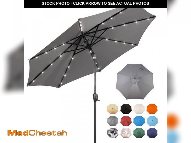 Lot 74-12402372 - 9 Ft. Steel Market Solar Lighted 8-Rib Round Patio Umbrella in Grey - UNUSED