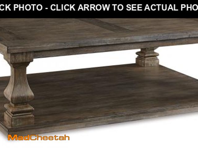 Lot 74-12336647 - Signature Design by Ashley Johnelle Farmhouse Coffee Table with Weathered Gray Finish, Gray - UNUSED