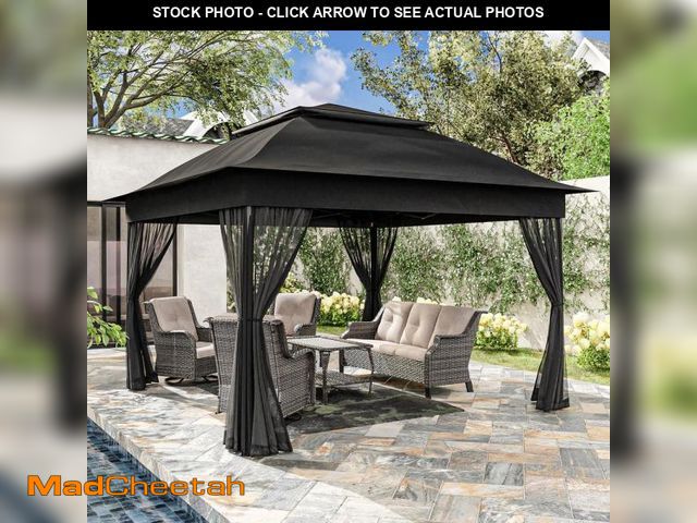 Lot 74-12492196 - JOYSIDE 11 ft. x 11 ft. Black Steel Pop-Up Gazebo with Mosquito Netting - UNUSED