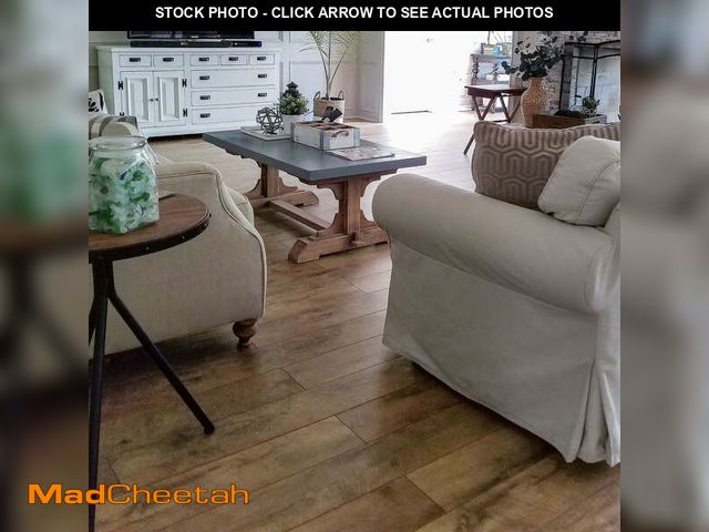 Lot 74-12862213 - Select Surfaces Barnwood SpillDefense Laminate Flooring, 12.34 sq. ft. per box - UNUSED